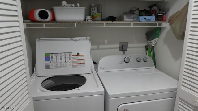 17156 Ravens Roost Unit 7, Fort Myers, FL 33908 - washroom featuring washing machine and clothes dryer