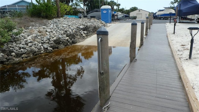 17156 Ravens Roost Unit 7, Fort Myers, FL 33908 - dock area featuring a water view
