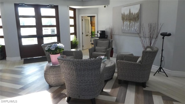 17156 Ravens Roost Unit 7, Fort Myers, FL 33908 - living room featuring light wood finished floors and baseboards
