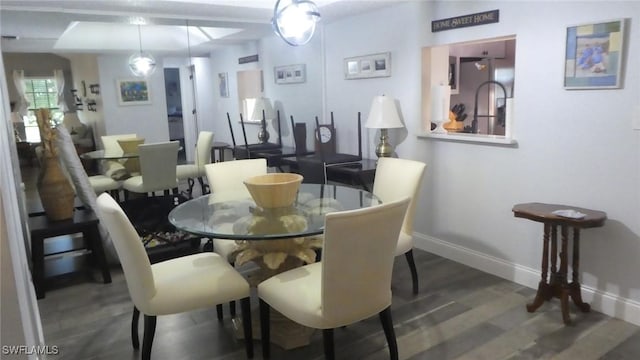 17156 Ravens Roost Unit 7, Fort Myers, FL 33908 - dining room with baseboards and wood finished floors