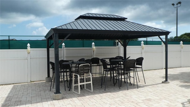 17156 Ravens Roost Unit 7, Fort Myers, FL 33908 - view of patio with a gazebo and outdoor dining area