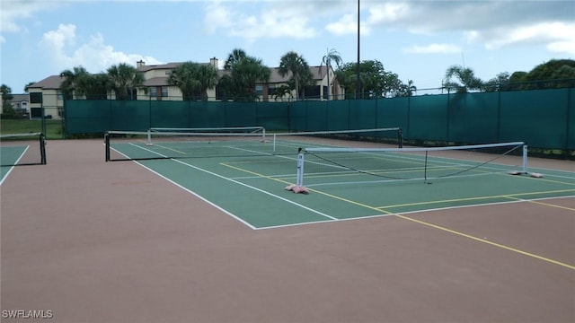17156 Ravens Roost Unit 7, Fort Myers, FL 33908 - view of tennis court featuring community basketball court