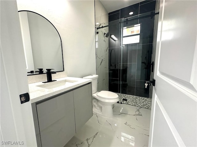 2607 E 18th St, Lehigh Acres, FL 33972 - full bathroom featuring marble finish flooring, a stall shower, vanity, and toilet