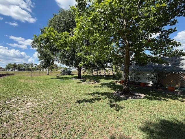 1200 Elaine Ave N, Lehigh Acres, FL 33971 - view of grassy yard