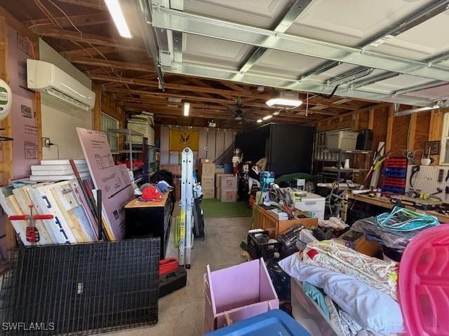 1200 Elaine Ave N, Lehigh Acres, FL 33971 - garage with a wall unit AC