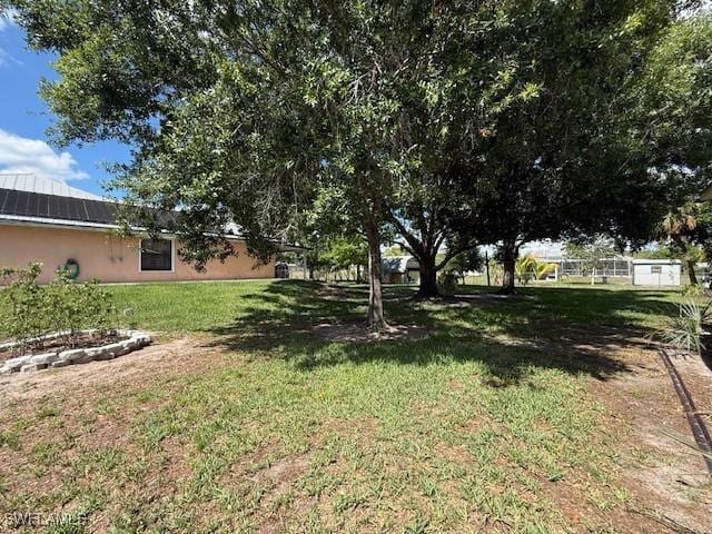 1200 Elaine Ave N, Lehigh Acres, FL 33971 - view of green lawn