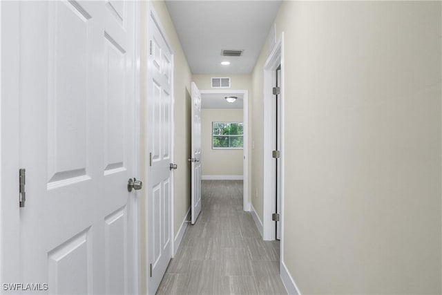 876 Apartment St E, Lehigh Acres, FL 33974 - hall featuring baseboards