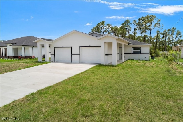876 Apartment St E, Lehigh Acres, FL 33974 - view of front facade with an attached garage, stucco siding, and driveway