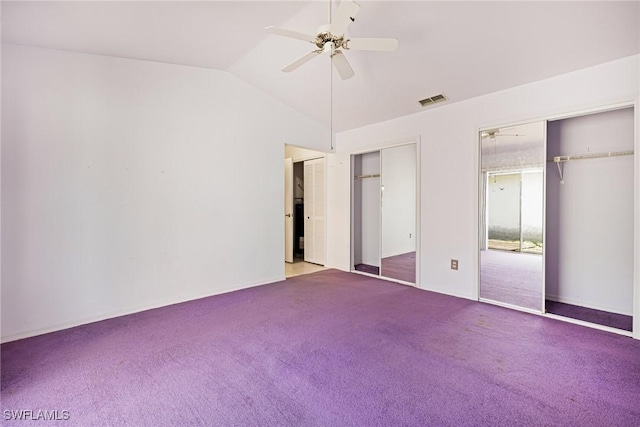 13670 Abbey Dr Unit 4, Fort Myers, FL 33919 - unfurnished bedroom featuring two closets, carpet floors, vaulted ceiling, and ceiling fan