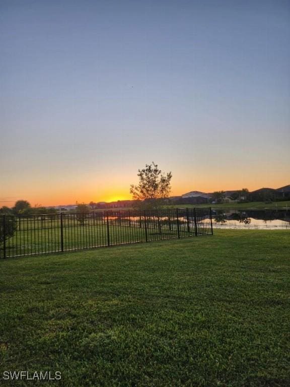 16006 Mistflower Dr, Alva, FL 33920 - view of yard at dusk