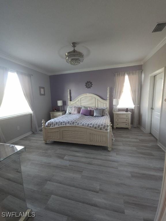 16006 Mistflower Dr, Alva, FL 33920 - bedroom featuring crown molding and wood finished floors