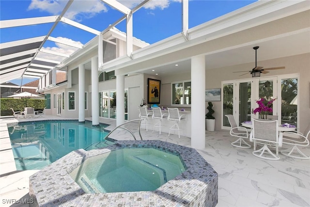 287 Meadowlark Ct, Marco Island, FL 34145 - view of pool featuring a pool with connected hot tub, a patio, and a ceiling fan