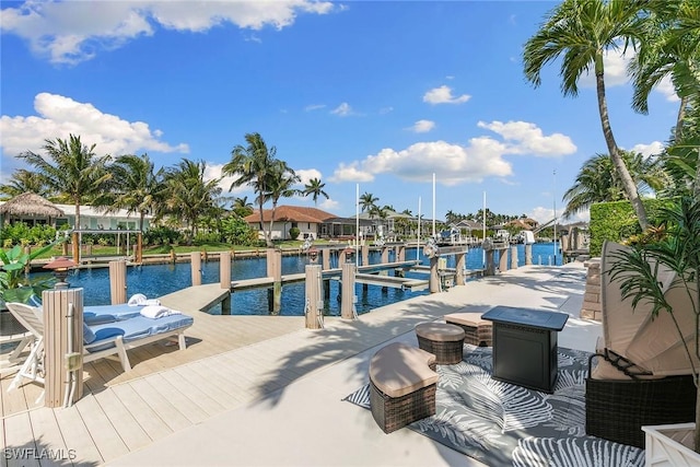 287 Meadowlark Ct, Marco Island, FL 34145 - dock featuring a water view