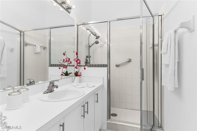 154 Newport Dr Unit 1307, Naples, FL 34114 - bathroom featuring a shower stall and vanity