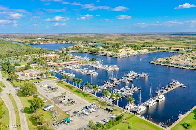 154 Newport Dr Unit 1307, Naples, FL 34114 - drone / aerial view of numerous boat docks and a nearby body of water