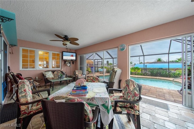 134 Dartmouth Dr NW, Port Charlotte, FL 33952 - sunroom / solarium with a ceiling fan and outdoor lounge area