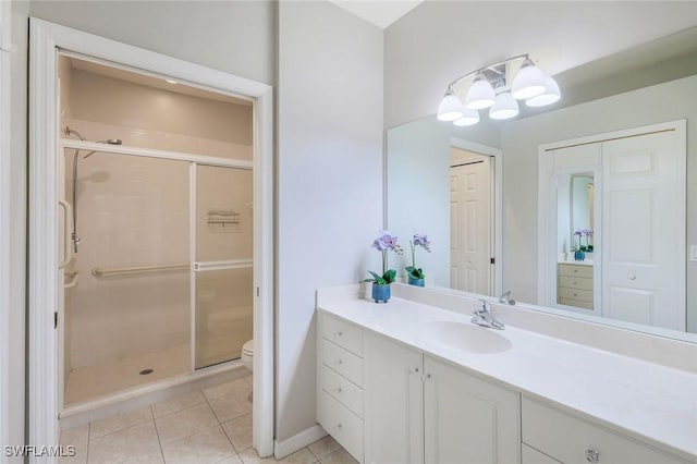 20101 Seagrove St Unit 702, Estero, FL 33928 - full bathroom with a shower stall, tile patterned flooring, toilet, and vanity