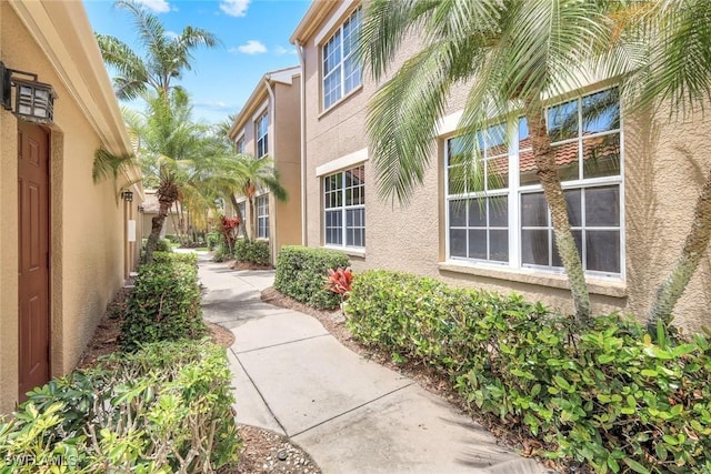 20101 Seagrove St Unit 702, Estero, FL 33928 - view of side of home featuring stucco siding