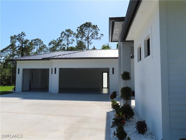 3813 16th Ave NE, Naples, FL 34120 - garage featuring driveway