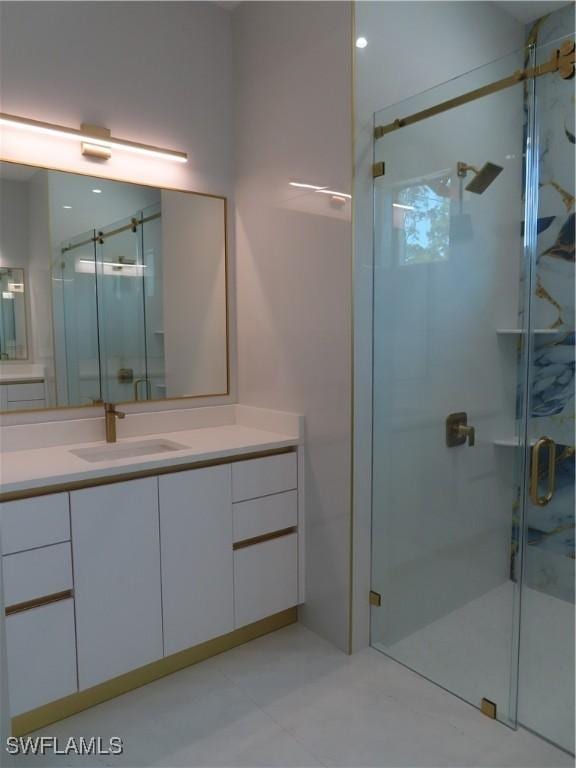 3813 16th Ave NE, Naples, FL 34120 - bathroom with a stall shower and vanity