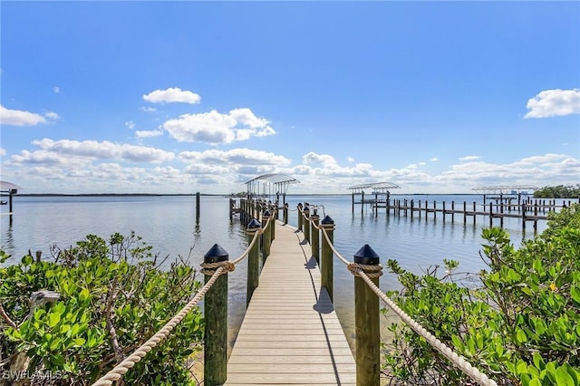 21401 Widgeon Ter, Fort Myers Beach, FL 33931 - dock area with boat lift and a water view