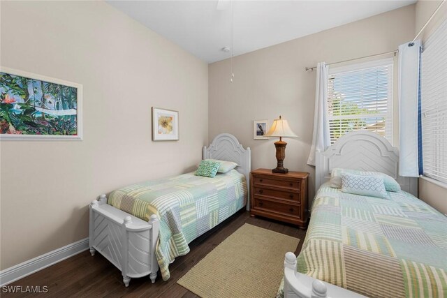 10450 Materita Dr, Fort Myers, FL 33913 - bedroom featuring wood finished floors and baseboards