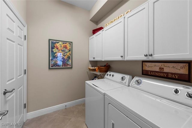 10450 Materita Dr, Fort Myers, FL 33913 - clothes washing area featuring cabinet space, washer and dryer, baseboards, and light tile patterned floors