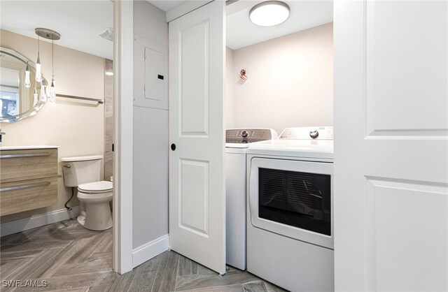 16320 Kelly Cove Dr Unit 267, Fort Myers, FL 33908 - laundry room with baseboards, independent washer and dryer, and electric panel