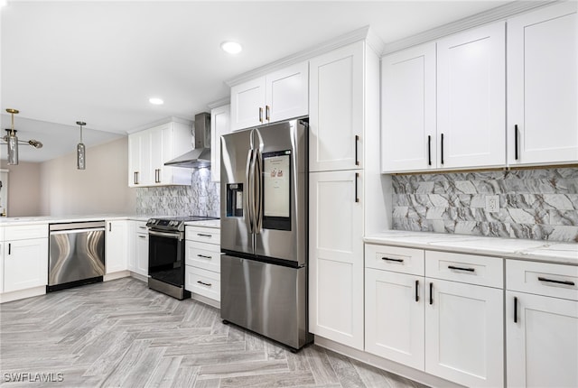 16320 Kelly Cove Dr Unit 267, Fort Myers, FL 33908 - kitchen with appliances with stainless steel finishes, wall chimney exhaust hood, recessed lighting, backsplash, and white cabinets