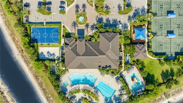 4172 Crescent Ct, Naples, FL 34119 - drone / aerial view of a pool area and a large body of water