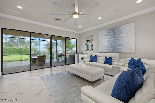 4172 Crescent Ct, Naples, FL 34119 - living area with light tile patterned floors, ornamental molding, a ceiling fan, and recessed lighting