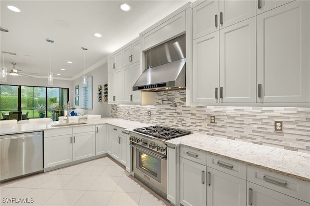 4172 Crescent Ct, Naples, FL 34119 - kitchen featuring dishwasher, a sink, wall chimney exhaust hood, ornamental molding, and decorative backsplash