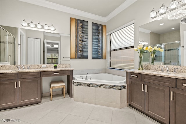 4172 Crescent Ct, Naples, FL 34119 - bathroom featuring a shower stall, a garden tub, ornamental molding, tile patterned flooring, and two vanities