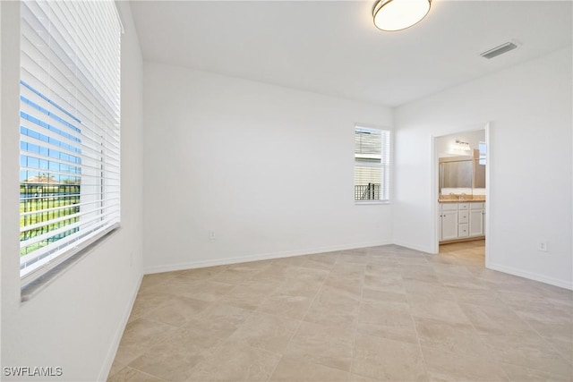 3663 Wild Sage Way, Alva, FL 33920 - unfurnished room featuring baseboards and a sink