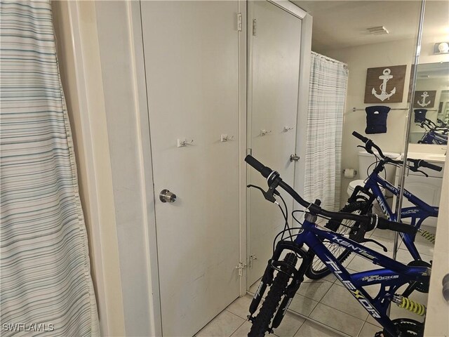 7330 Estero Blvd Unit 601, Fort Myers Beach, FL 33931 - exercise room featuring light tile patterned floors