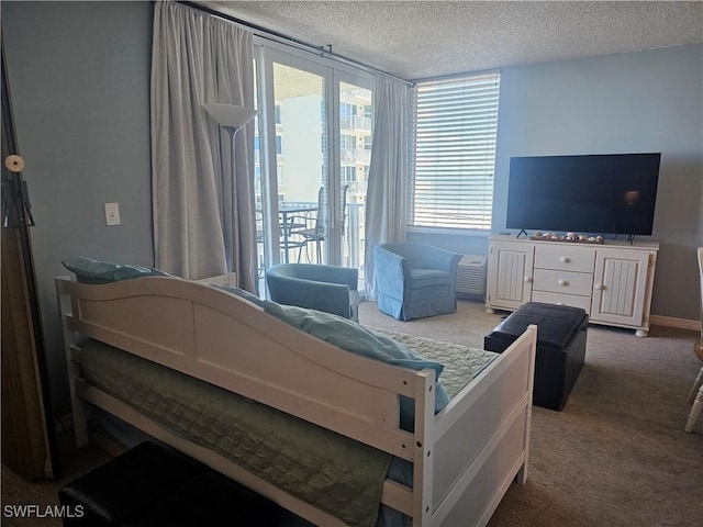7330 Estero Blvd Unit 601, Fort Myers Beach, FL 33931 - bedroom featuring a textured ceiling and carpet