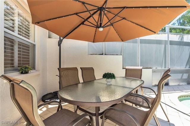8032 Kilkenny Way Unit G33, Naples, FL 34112 - view of patio with outdoor dining area