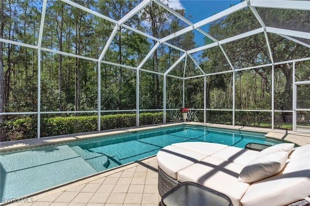 8032 Kilkenny Way Unit G33, Naples, FL 34112 - swimming pool with a patio and glass enclosure
