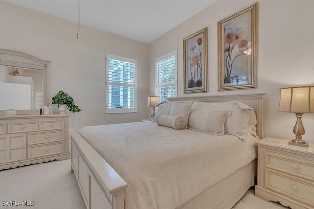 8032 Kilkenny Way Unit G33, Naples, FL 34112 - bedroom featuring light colored carpet