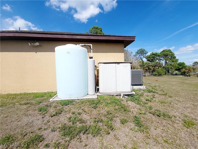 506 Desoto Ave, Lehigh Acres, FL 33972 - view of outdoor structure featuring central air condition unit