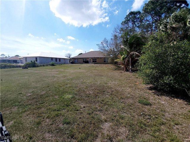 506 Desoto Ave, Lehigh Acres, FL 33972 - view of grassy yard