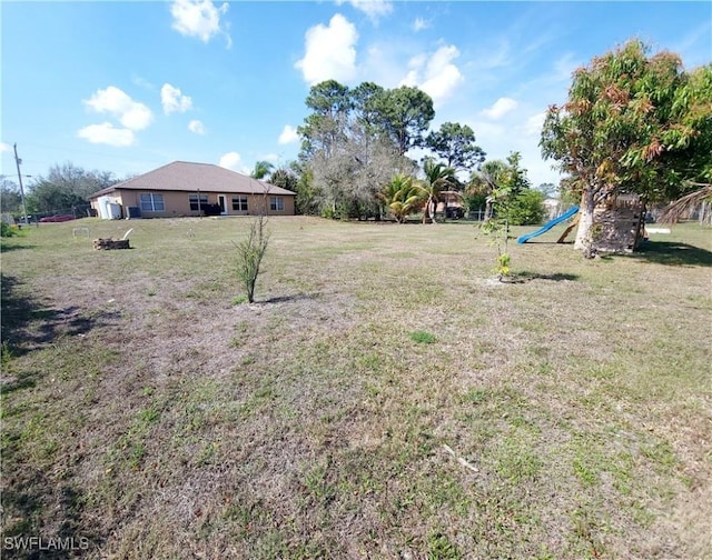 506 Desoto Ave, Lehigh Acres, FL 33972 - view of green lawn
