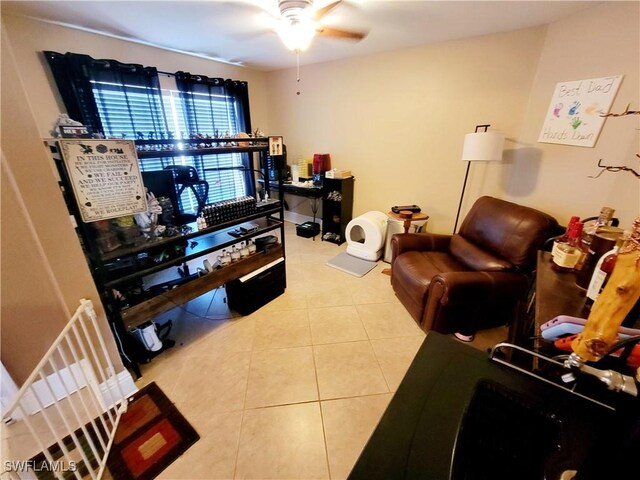 506 Desoto Ave, Lehigh Acres, FL 33972 - living area featuring a ceiling fan and tile patterned flooring