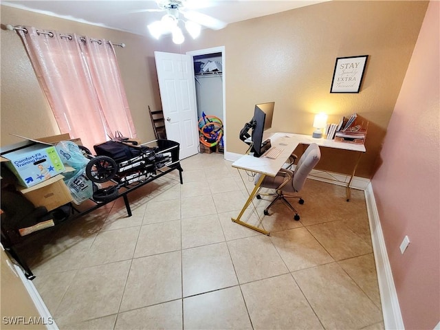 506 Desoto Ave, Lehigh Acres, FL 33972 - tiled office space with a ceiling fan and baseboards