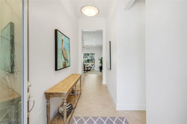 9578 Coquina Cir, Naples, FL 34120 - hallway with light tile patterned flooring and baseboards