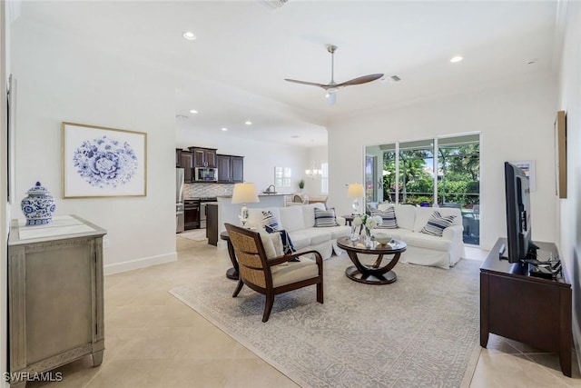 9578 Coquina Cir, Naples, FL 34120 - living area featuring healthy amount of natural light, a ceiling fan, light tile patterned flooring, and recessed lighting