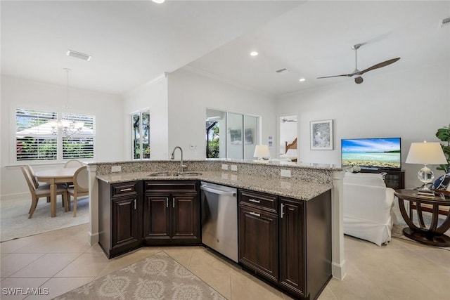 9578 Coquina Cir, Naples, FL 34120 - kitchen with a sink, stainless steel dishwasher, light tile patterned floors, light stone counters, and recessed lighting