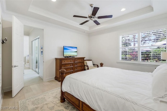 9578 Coquina Cir, Naples, FL 34120 - bedroom with a raised ceiling, light wood-style flooring, ornamental molding, recessed lighting, and ceiling fan