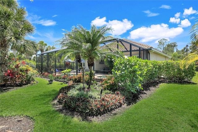 9578 Coquina Cir, Naples, FL 34120 - view of grassy yard featuring a lanai