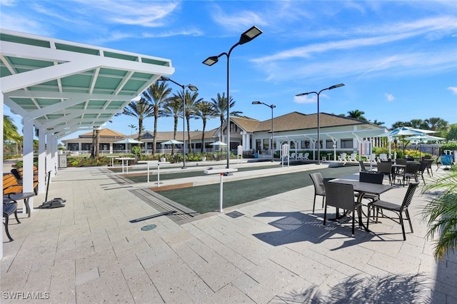 9578 Coquina Cir, Naples, FL 34120 - view of community featuring a game area and a residential view